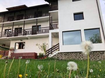 Фото номера Трехместный номер Гостевой дом Livada cu Meri г. Căpăţîneni-Ungureni 26